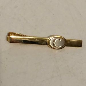 Tie clip with the letter “C”
